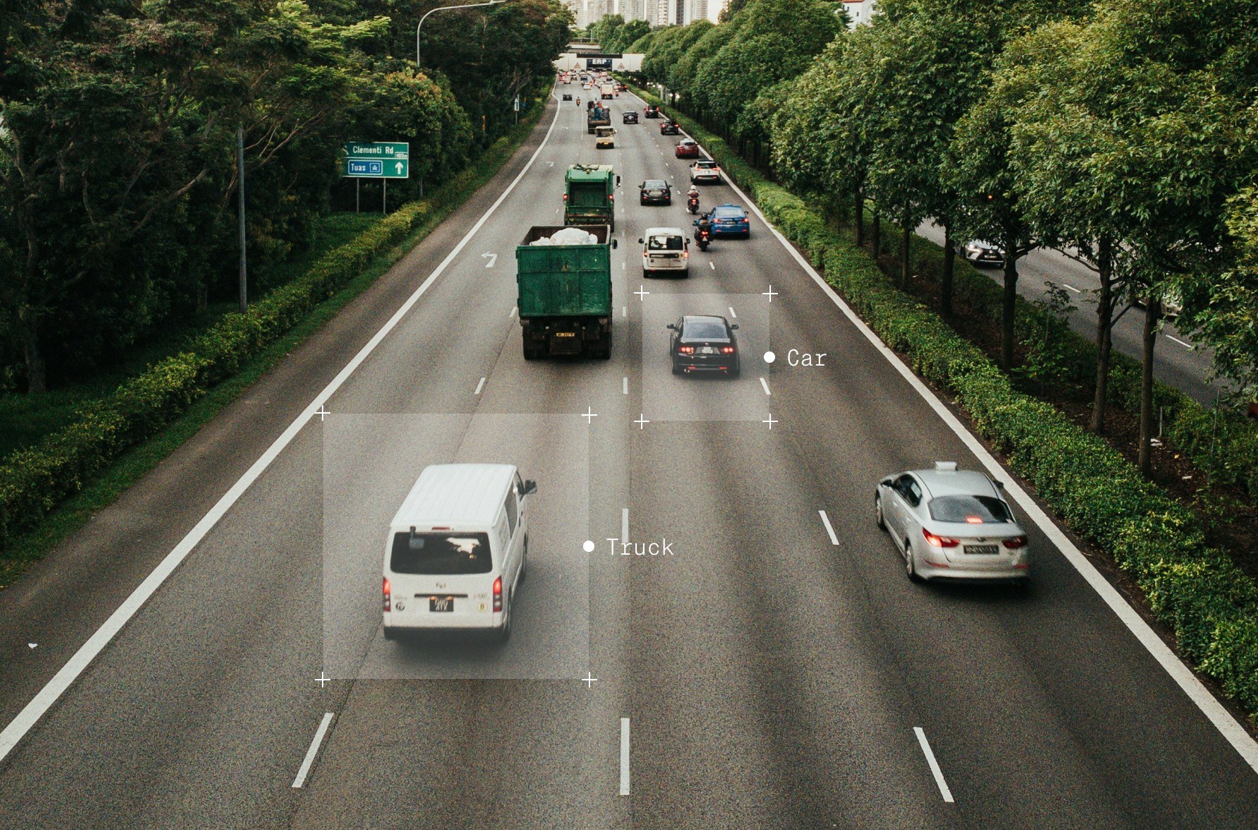 Car and truck, annotated on a busy road