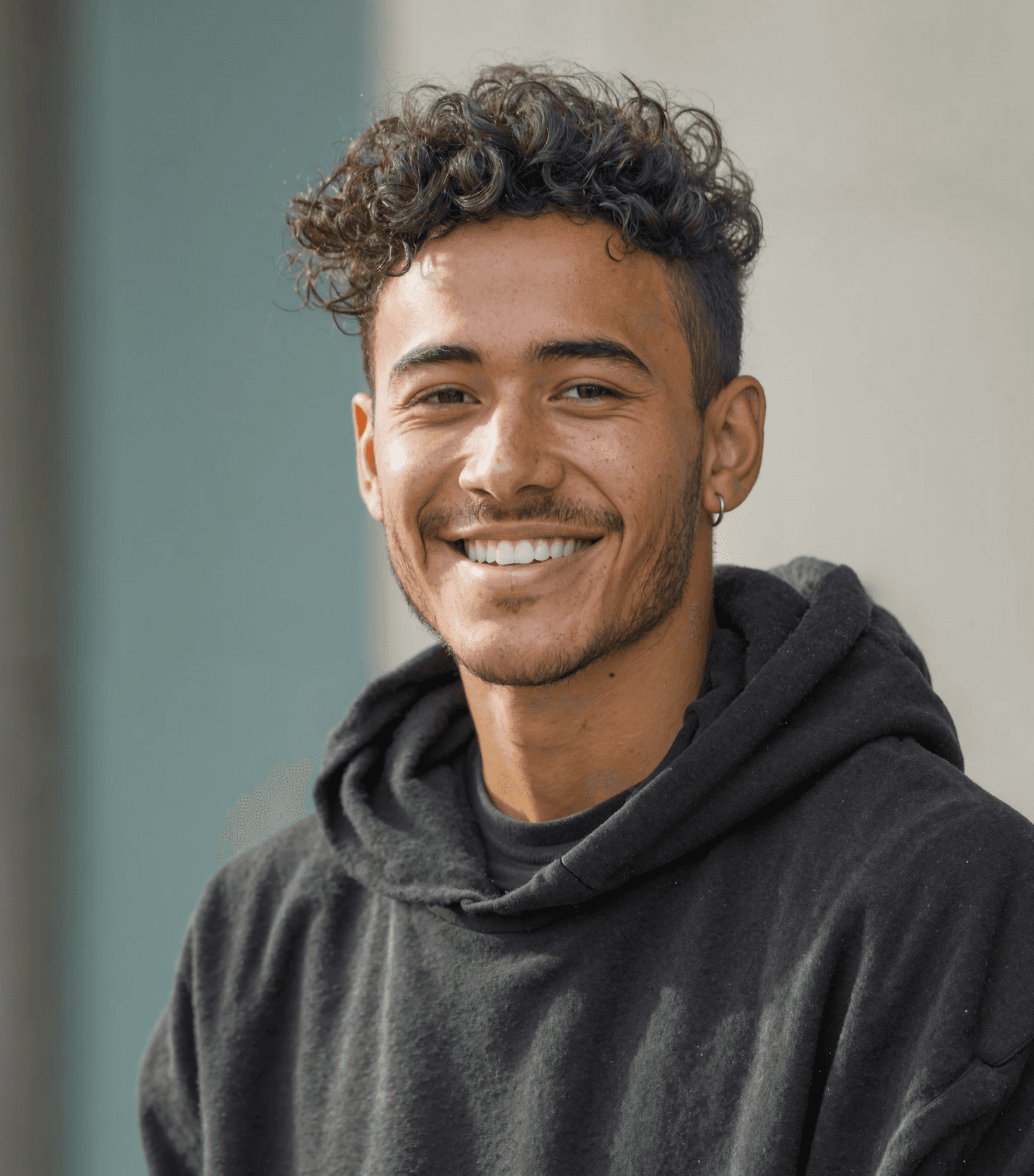 Young white/latino male in a hoodie representing a student for AI Indy