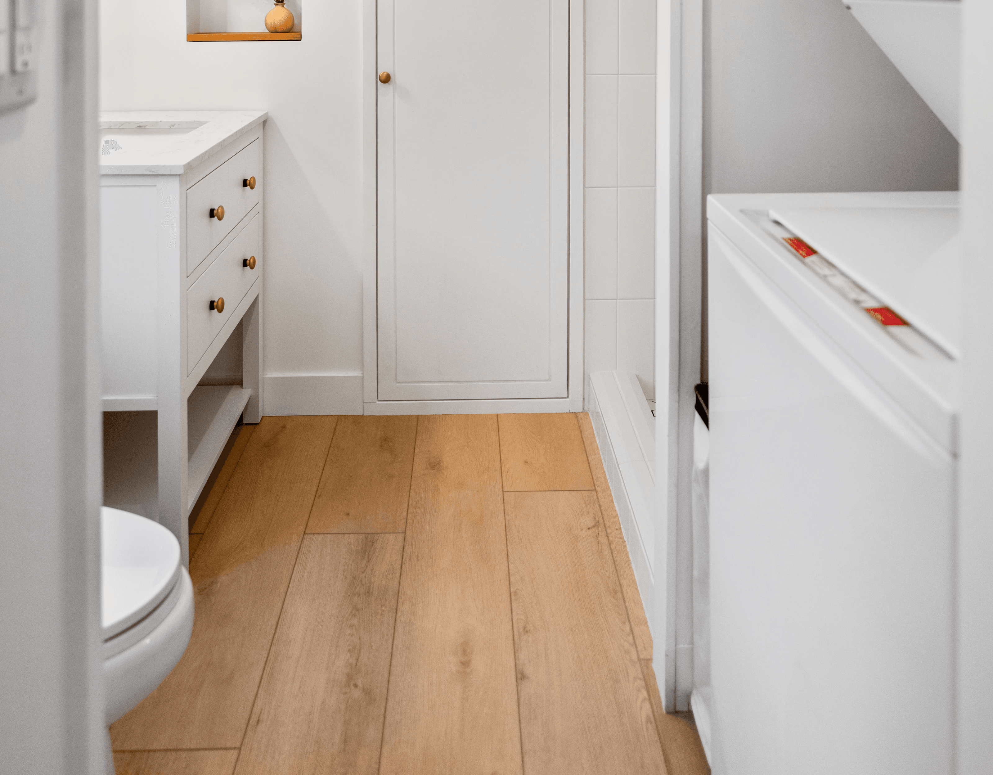 White painted cabinetry and countertop with modern plumbing in a Southern Utah bathroom remodel