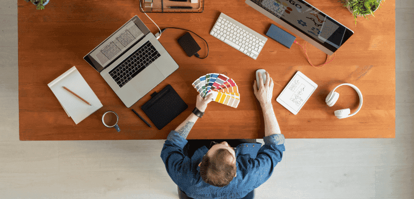 Person at desk looking at branding options