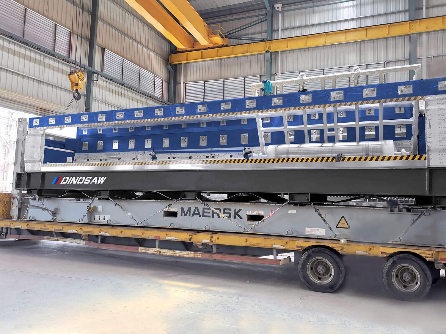 Fully-Automatic Polishing Machine loaded onto a shipping container, illustrating its size and readiness for export.