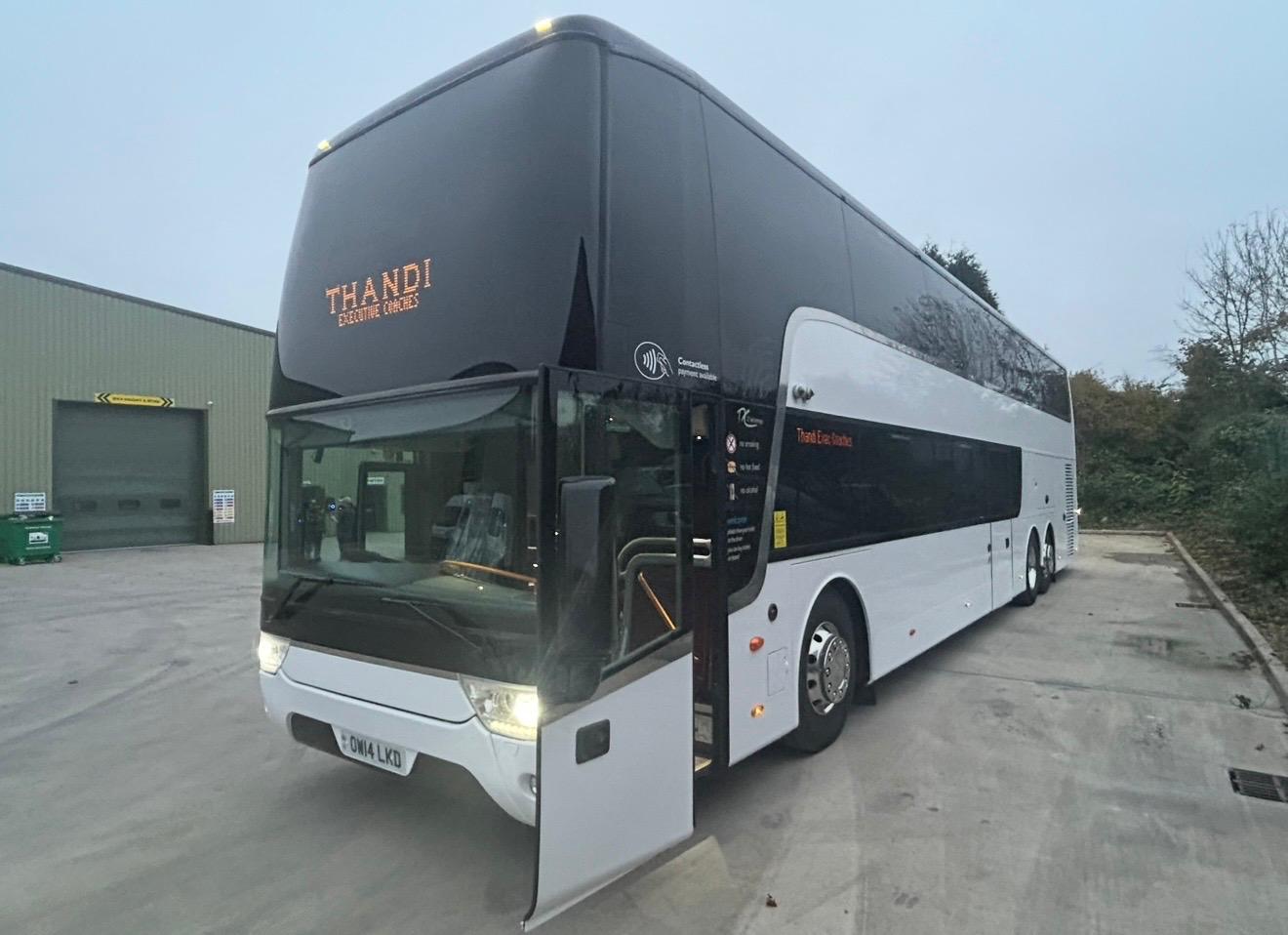 Luxury coach and minibus fleet used for city tours and private transfers, showcasing premium travel services and modern design in urban and scenic environments