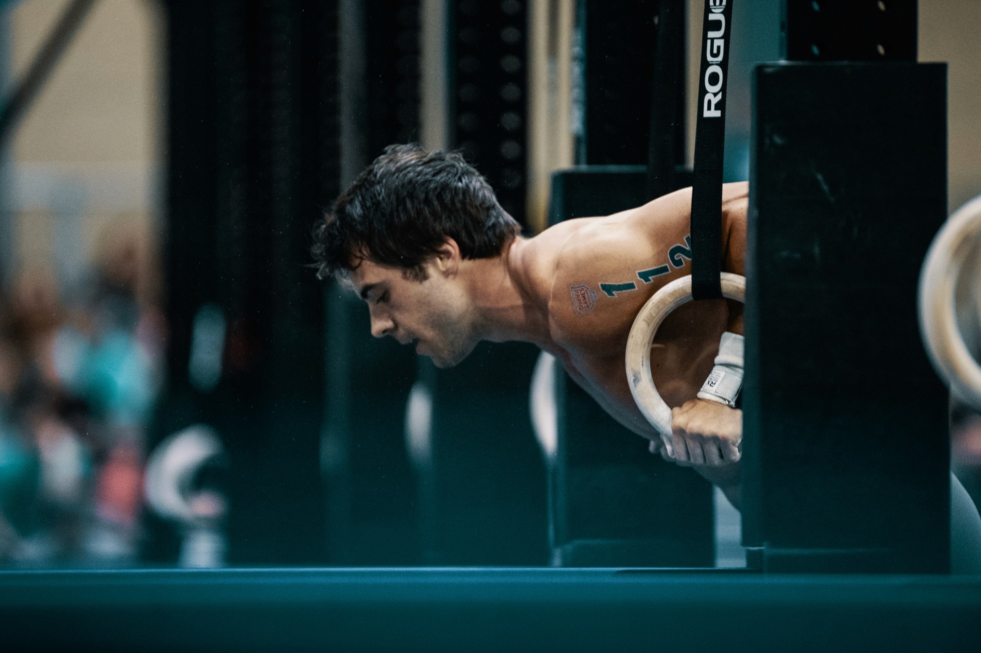 man in gym - Stiffness in Thighs and Legs