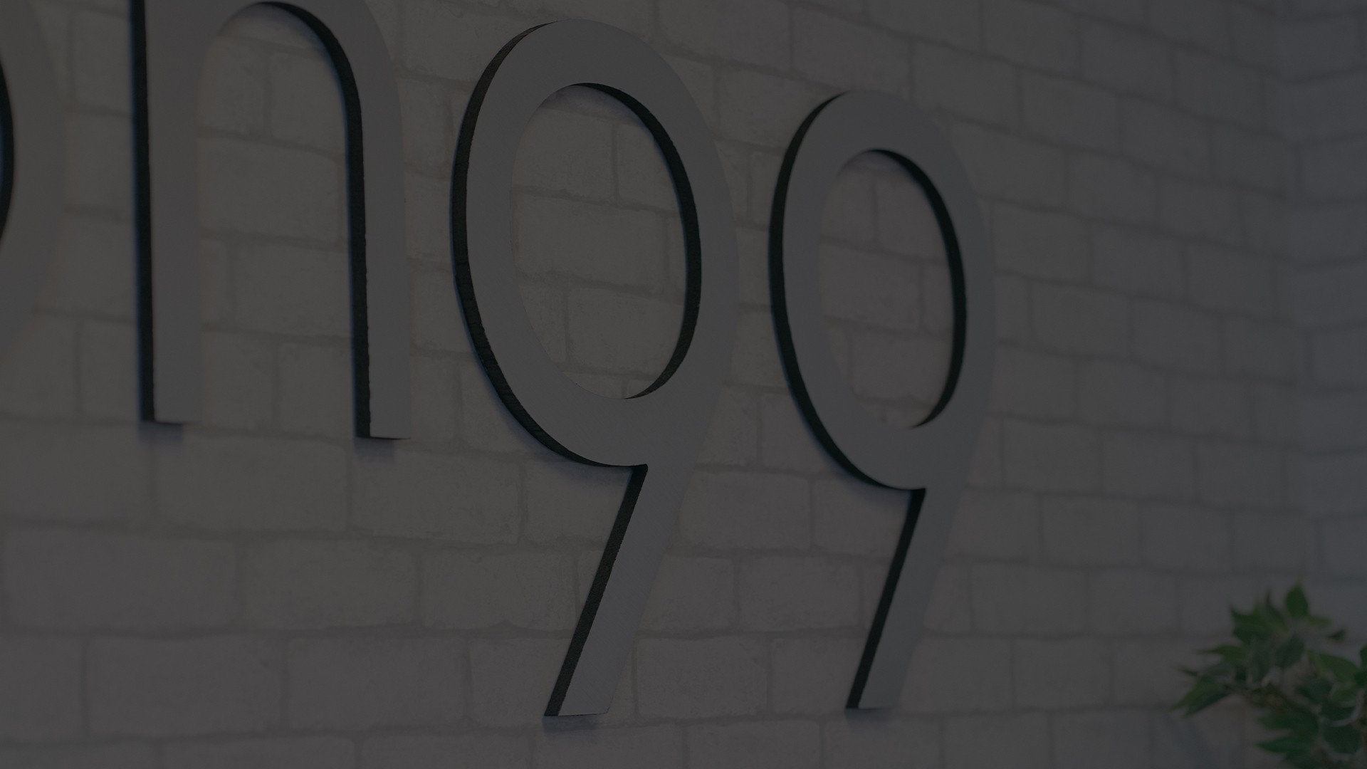 Two Men Using Laptop