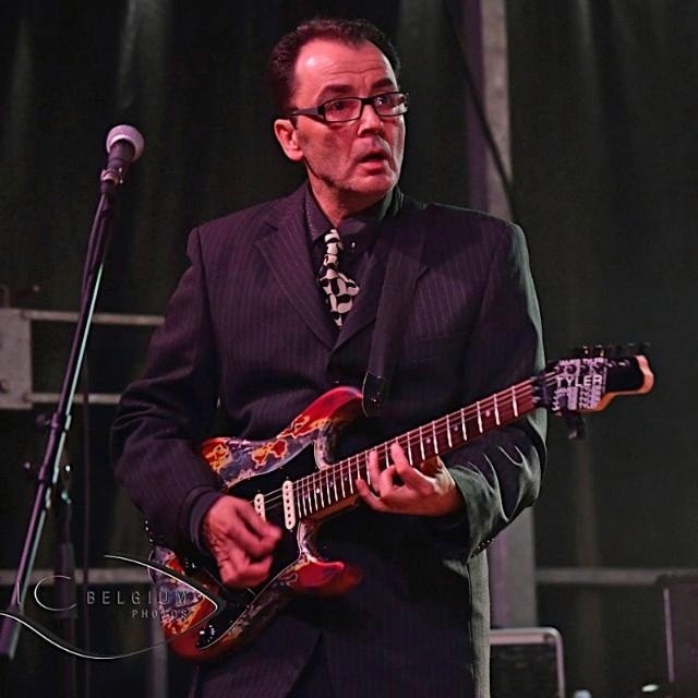 A man with surfboard