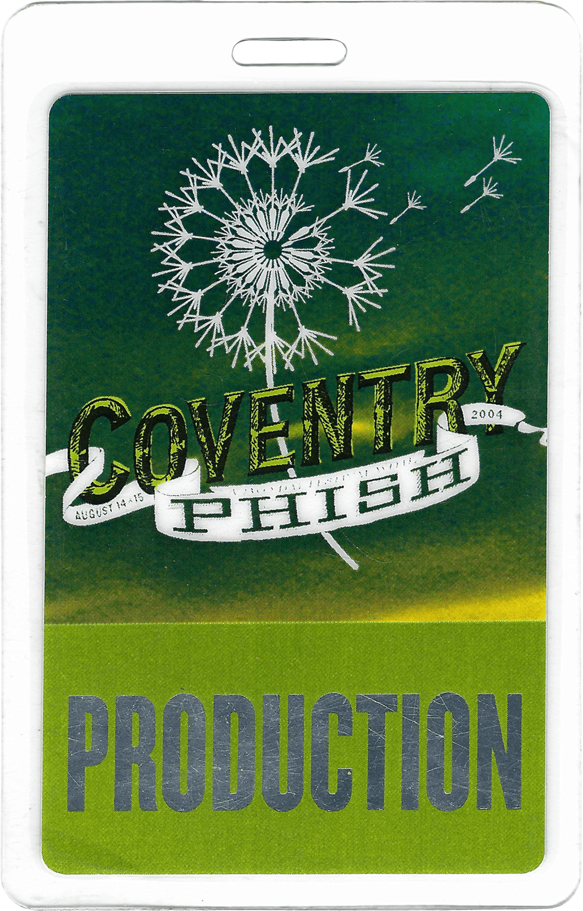 Green and white backstage pass with the word "PRODUCTION" and a graphic of a sun and stars in a circular pattern.