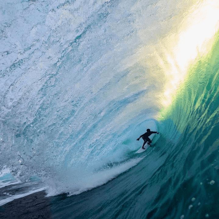 Surfer riding a wave – surfboard rental in oahu