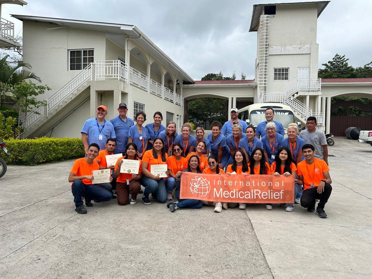 Medical brigade group outside a building