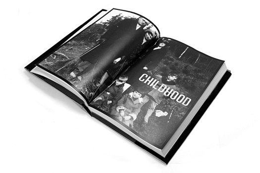 an opened book with two pages covered with an image and the text childhood