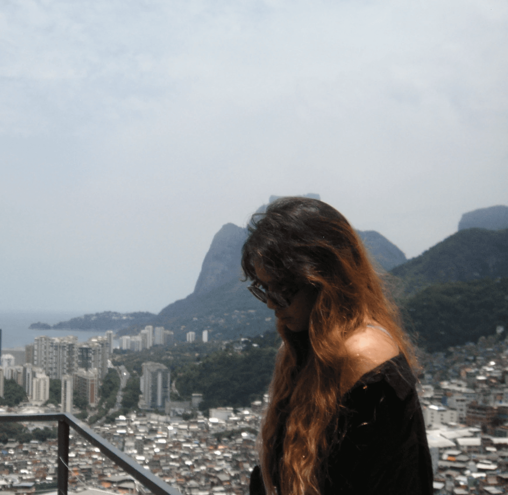 a blurry photo of a person standing in front of a wall