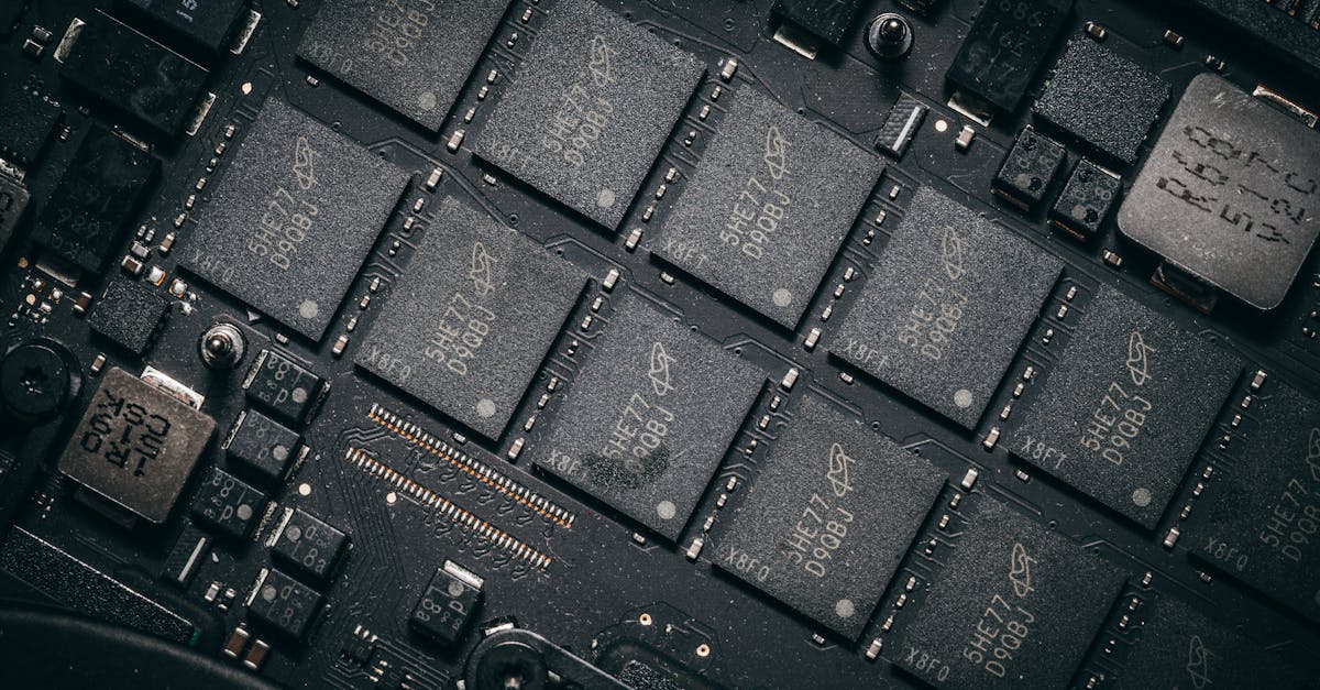 Detailed view of electronic circuit board components showcasing microchips and technology intricacie