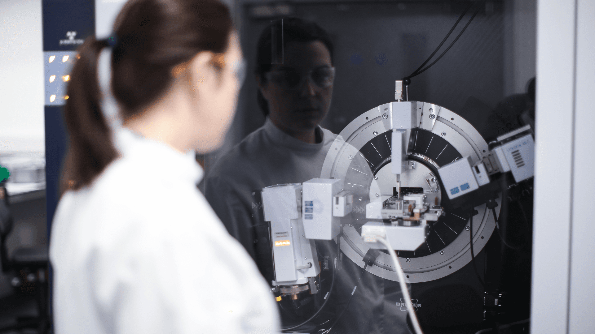 CPI expert inspecting an xrd machine.