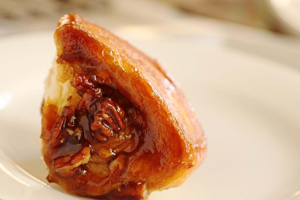 Group of students processing acorns together during a foraging class, representing shared learning and scholarship.