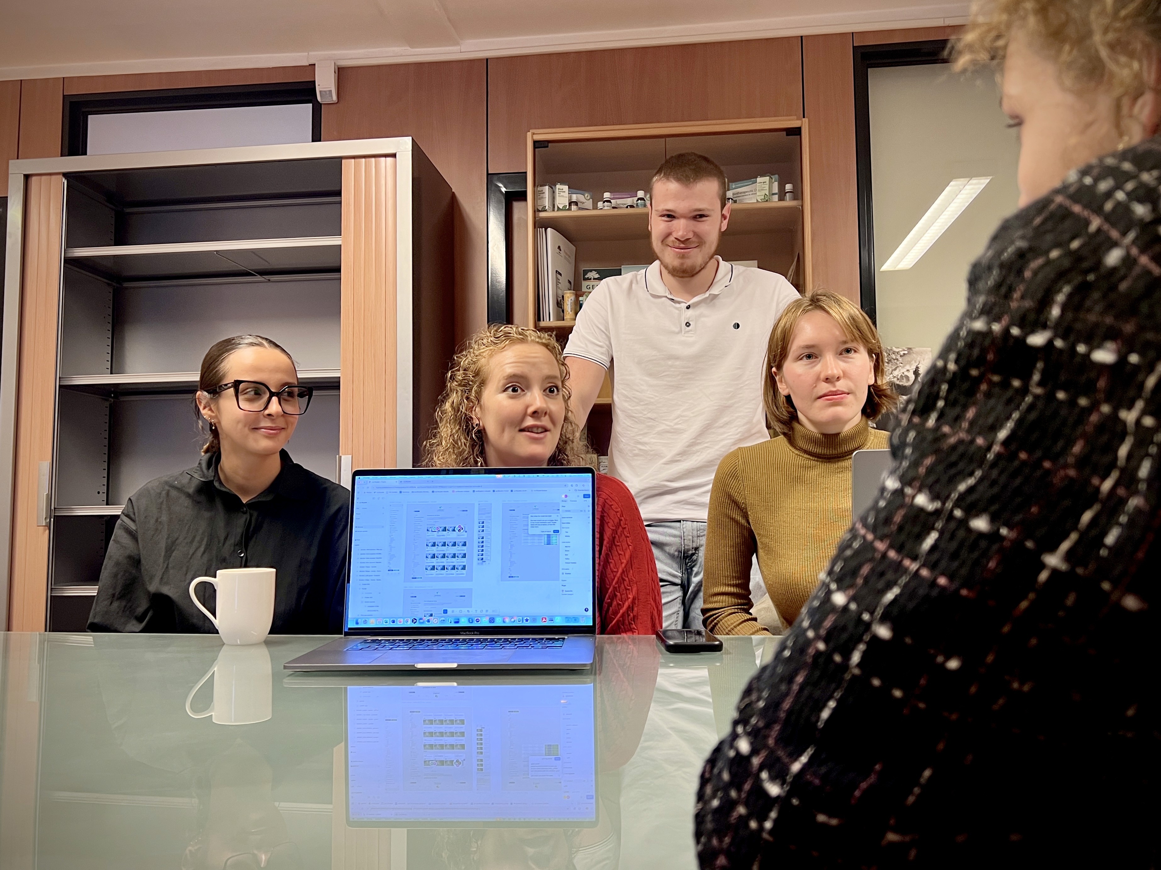Adele, Daria and the La-Royale team reviewing the work.