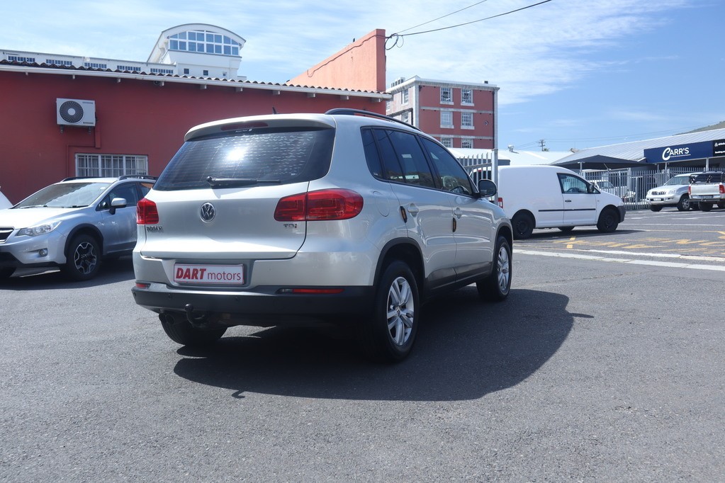 man in white crew neck shirt wearing black framed eyeglasses