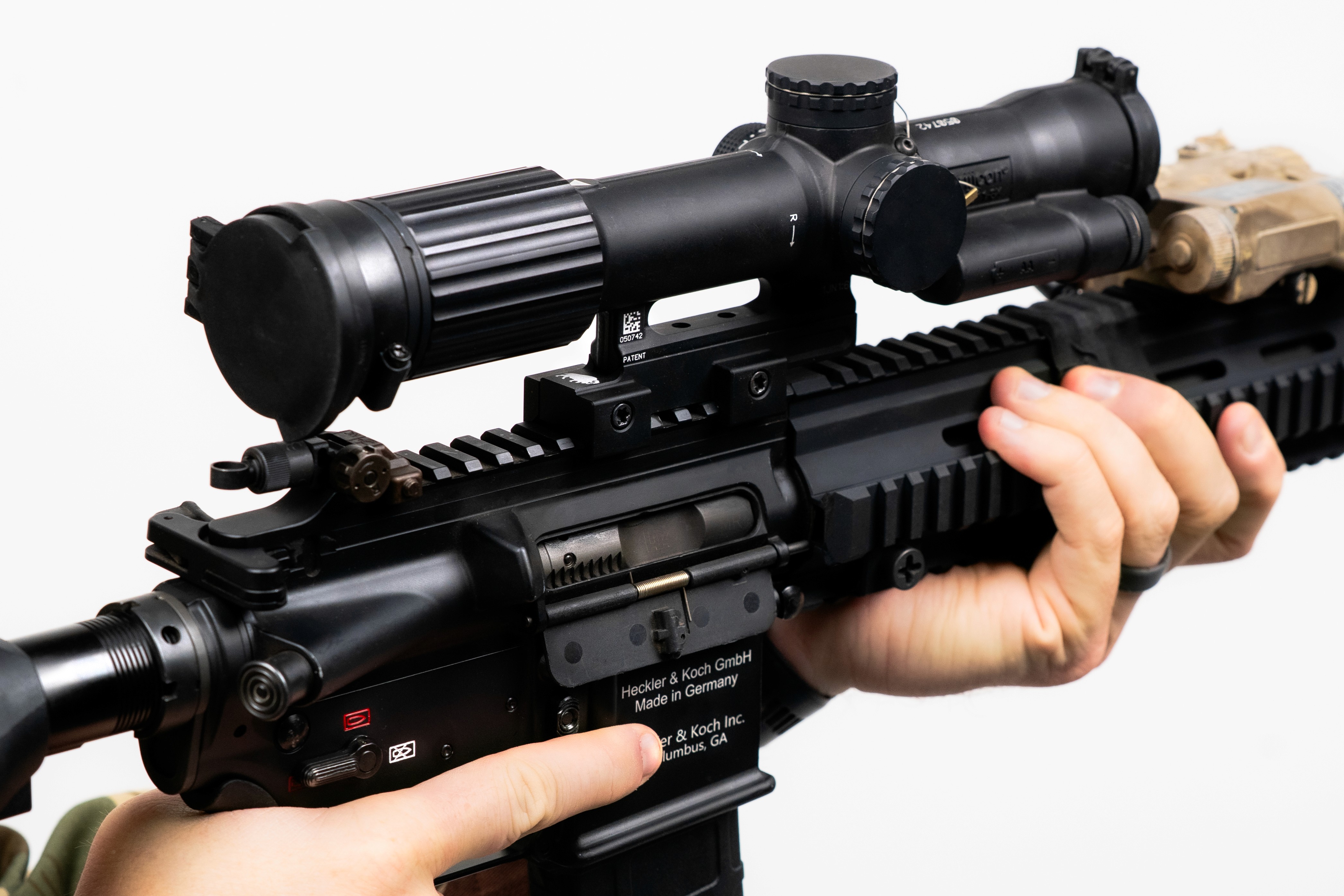 Artistic portrait with red and blue lighting creating a dramatic effect