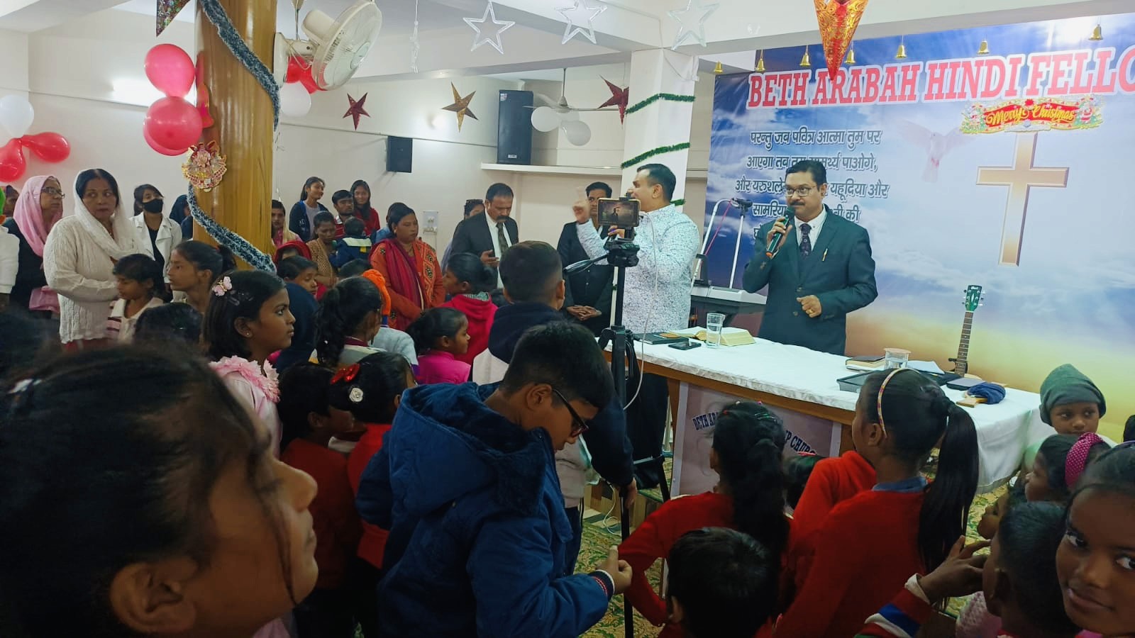 Inside a grand church with ornate decorations.