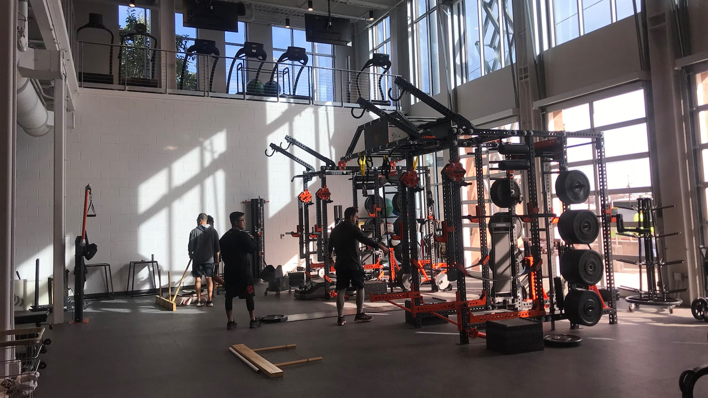 a group of people playing a game of ice hockey