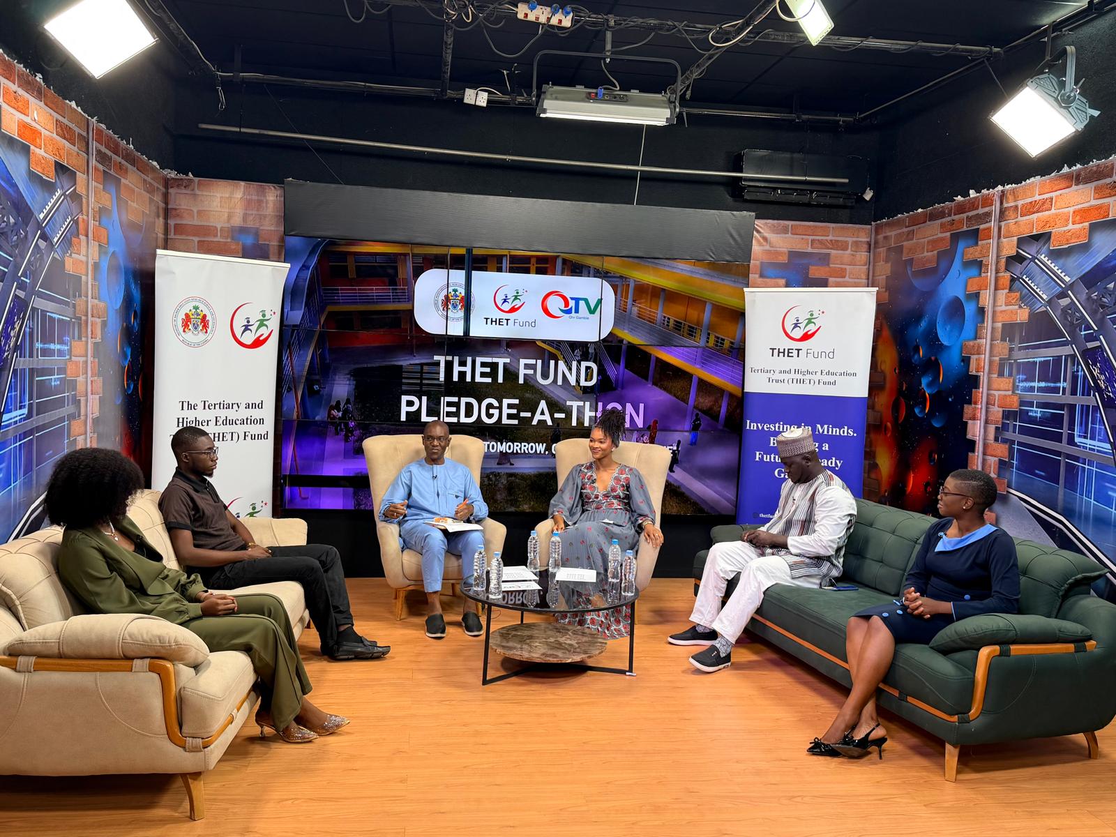 Standout Foundation Executive Director Faith Ememodo makes the Foundation’s GMD 14,770 pledge during the THET Fund Pledge-a-thon 2026 at QTV in The Gambia, supporting education and opportunities for young people