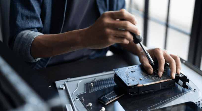 person sitting in a chair in front of a man
