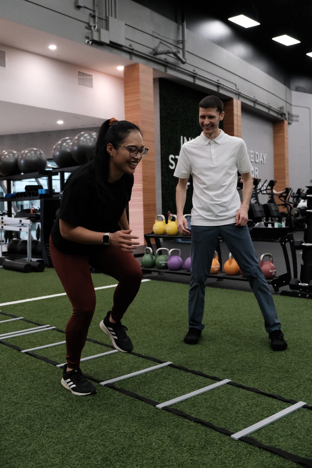 Agility ladder drill with a physiotherapist at Forza Physiotherapy