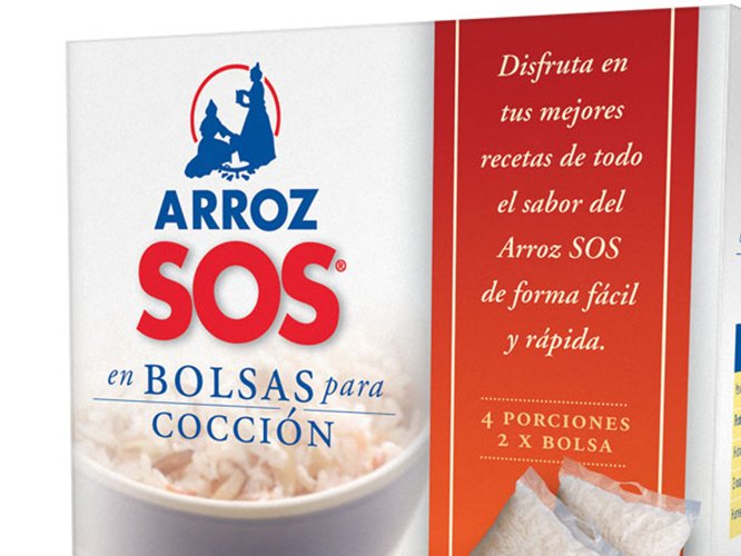 Rooftops of a coastal town with the sea in background