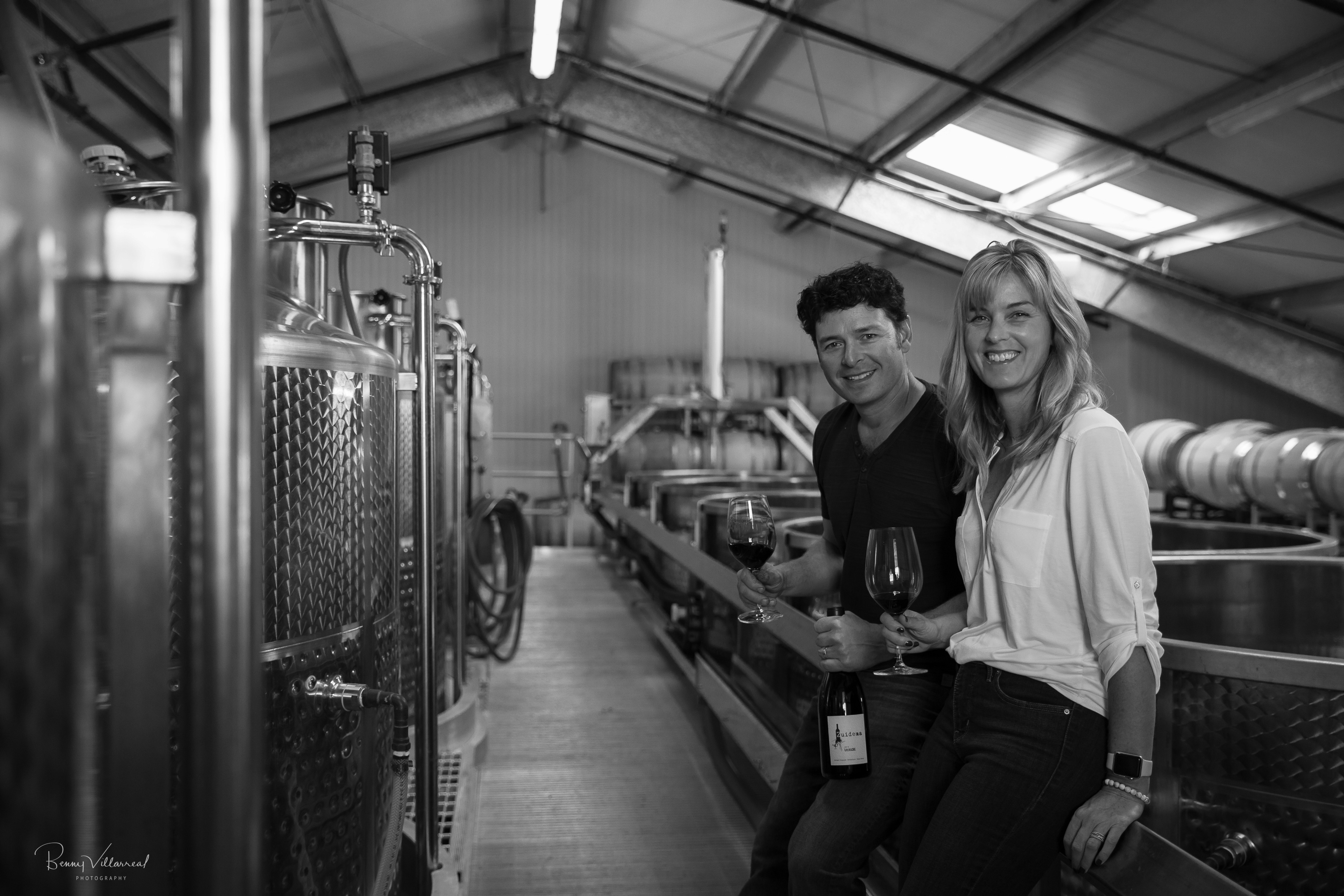 Rudy and Amy Zuidema in a wine cellar