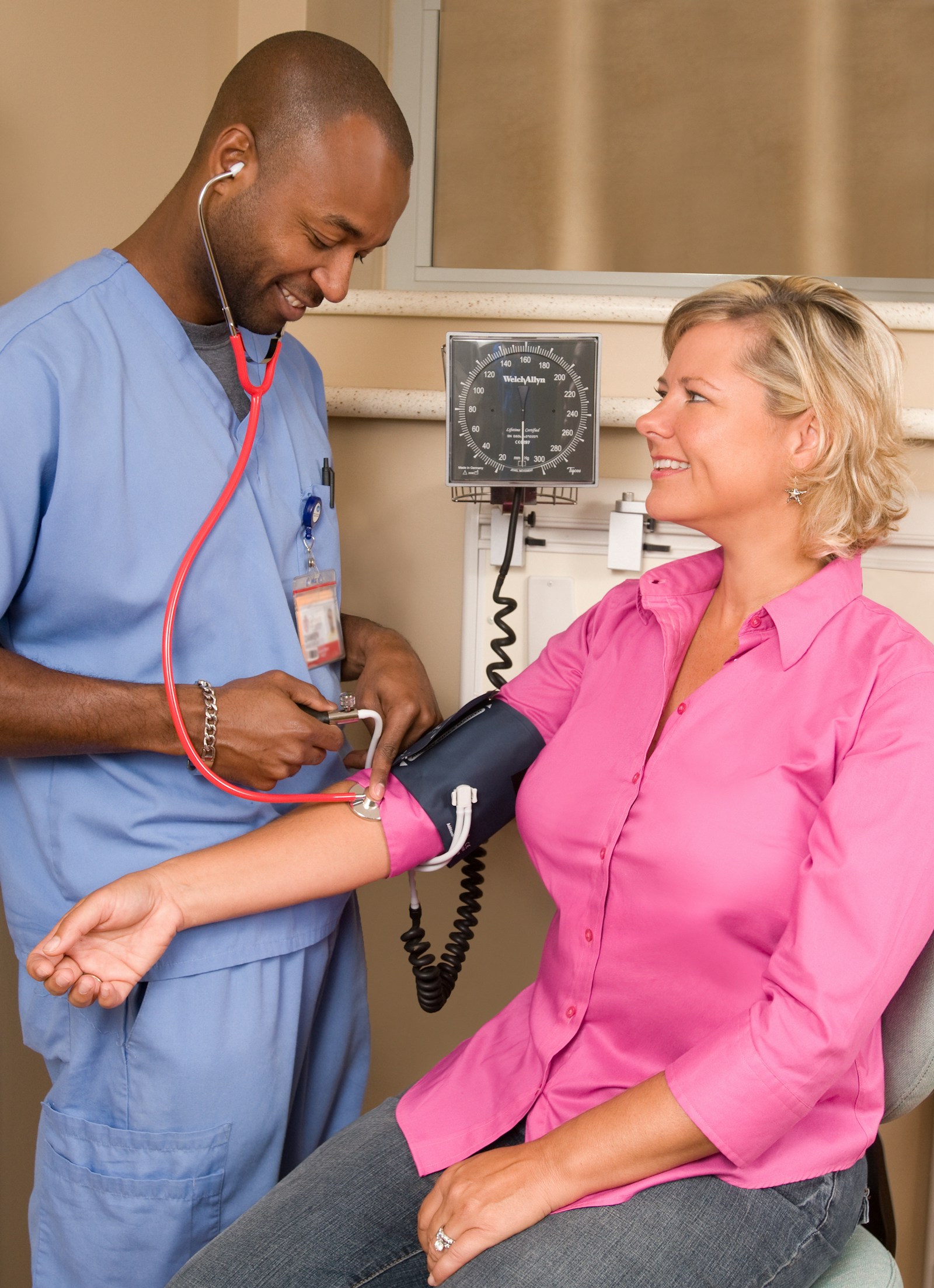 Clinician supporting a wellness patient
