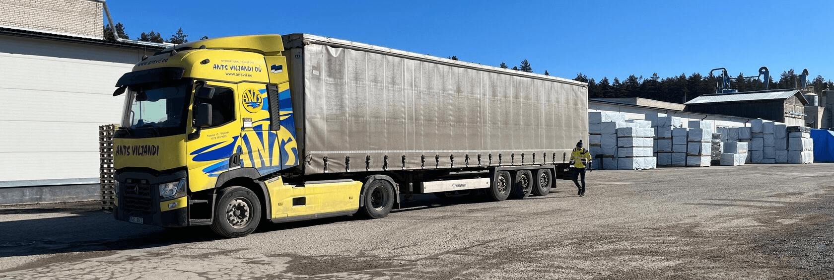 Ants Viljandi truck with a curtain-sider trailer at a loading yard