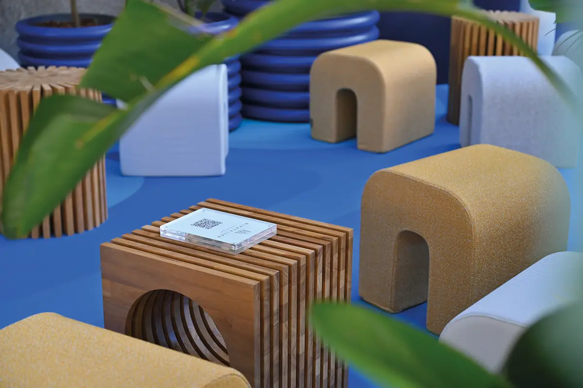 Artistic installation of handmade Italian luxury furniture by Rivatelier, contemporary luxury furniture brand, during Milan Fuorisalone.