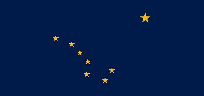 Alaska state flag features eight gold stars on a dark blue background, forming the Big Dipper and the North Star, symbolizing strength and northern position.