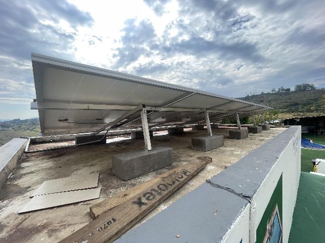 a man standing in a kitchen preparing food