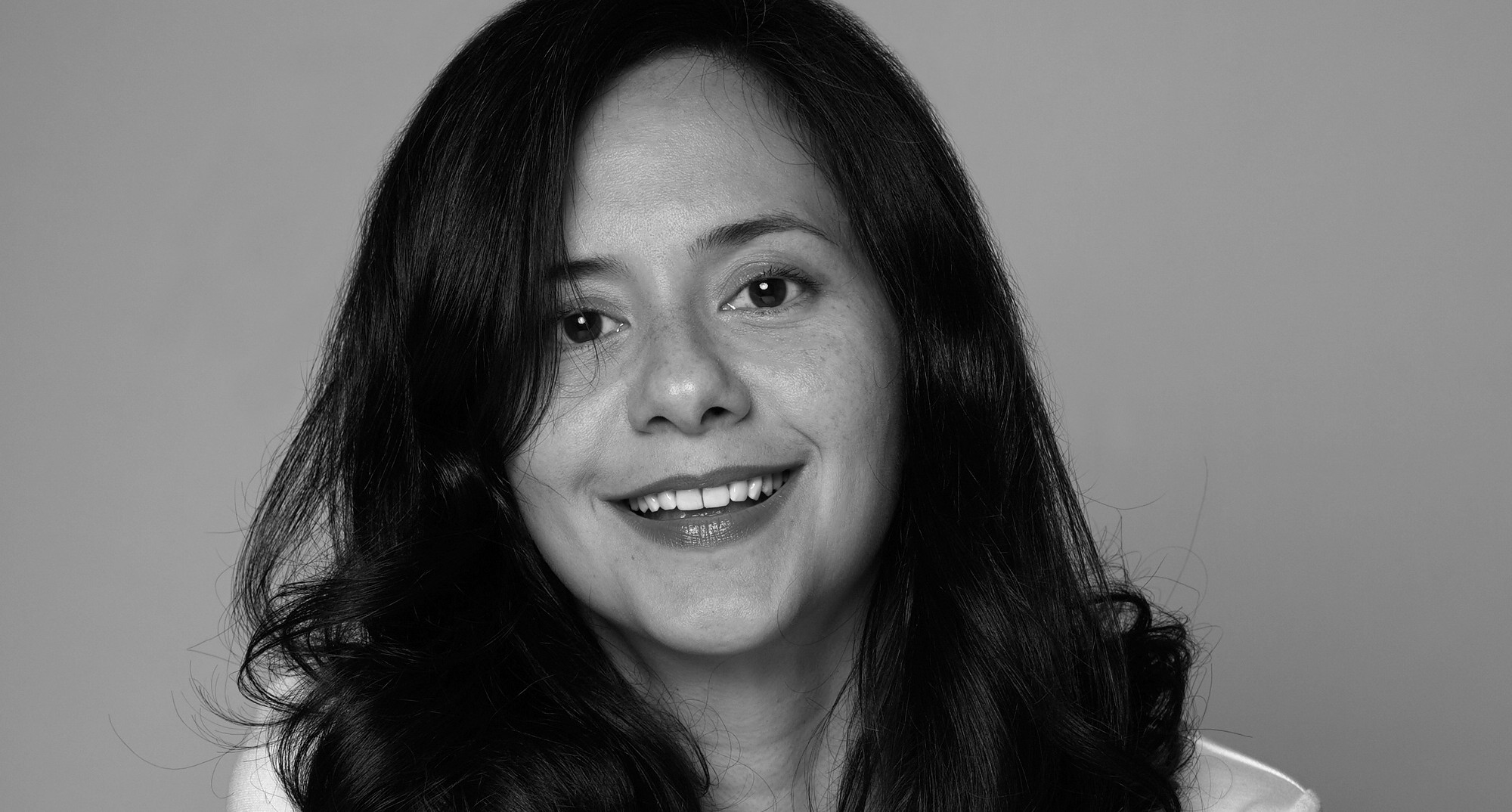 portrait of Tania Mailangkay in black and white