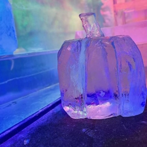 A pumpkin ice sculpture.