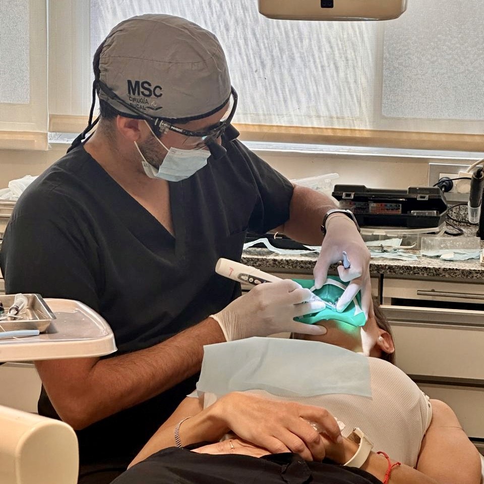 Close-up of dental tools and equipment arranged in a clinic setting