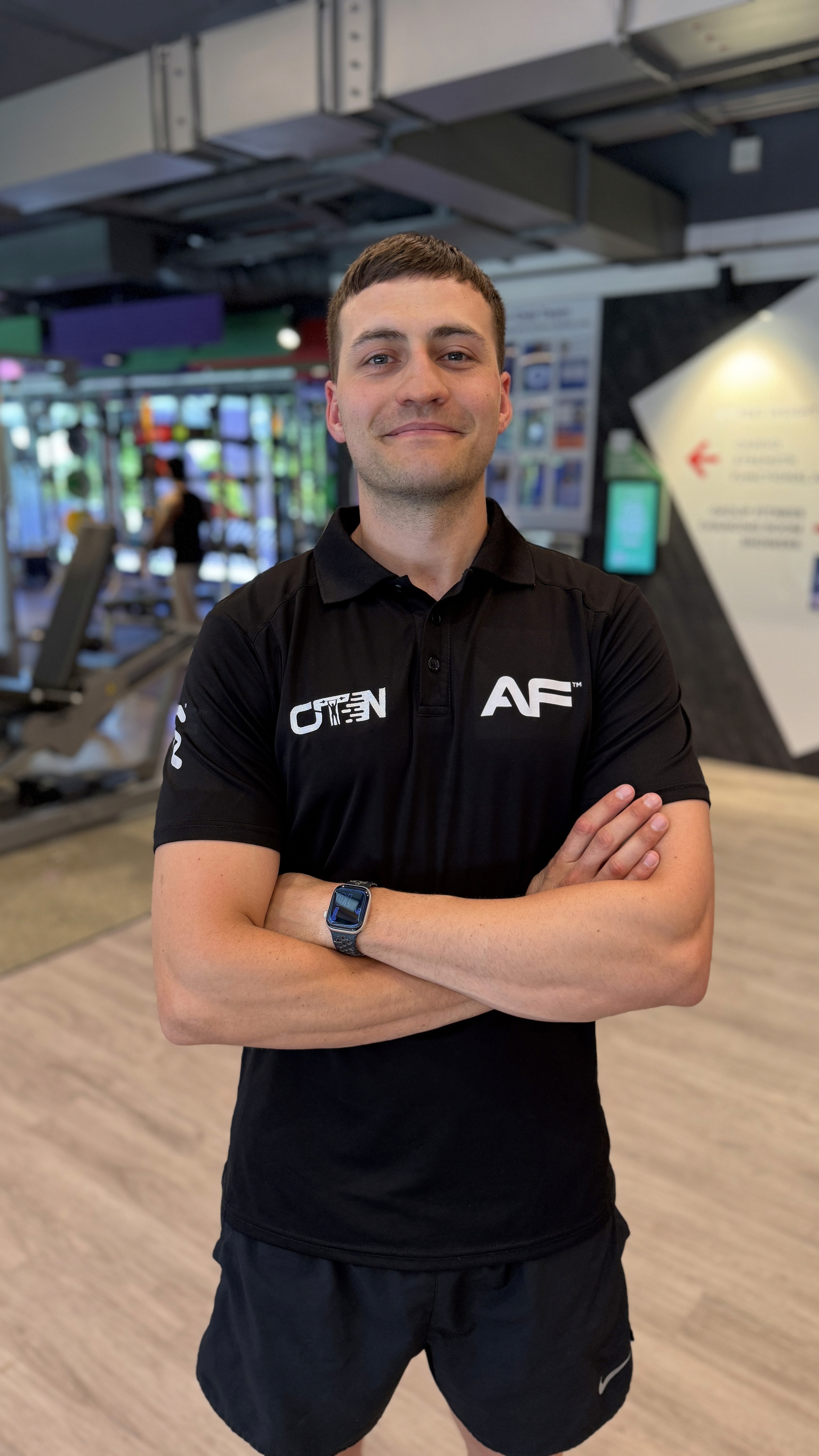 Rachel Stone, personal trainer and fitness coach, smiling in natural light