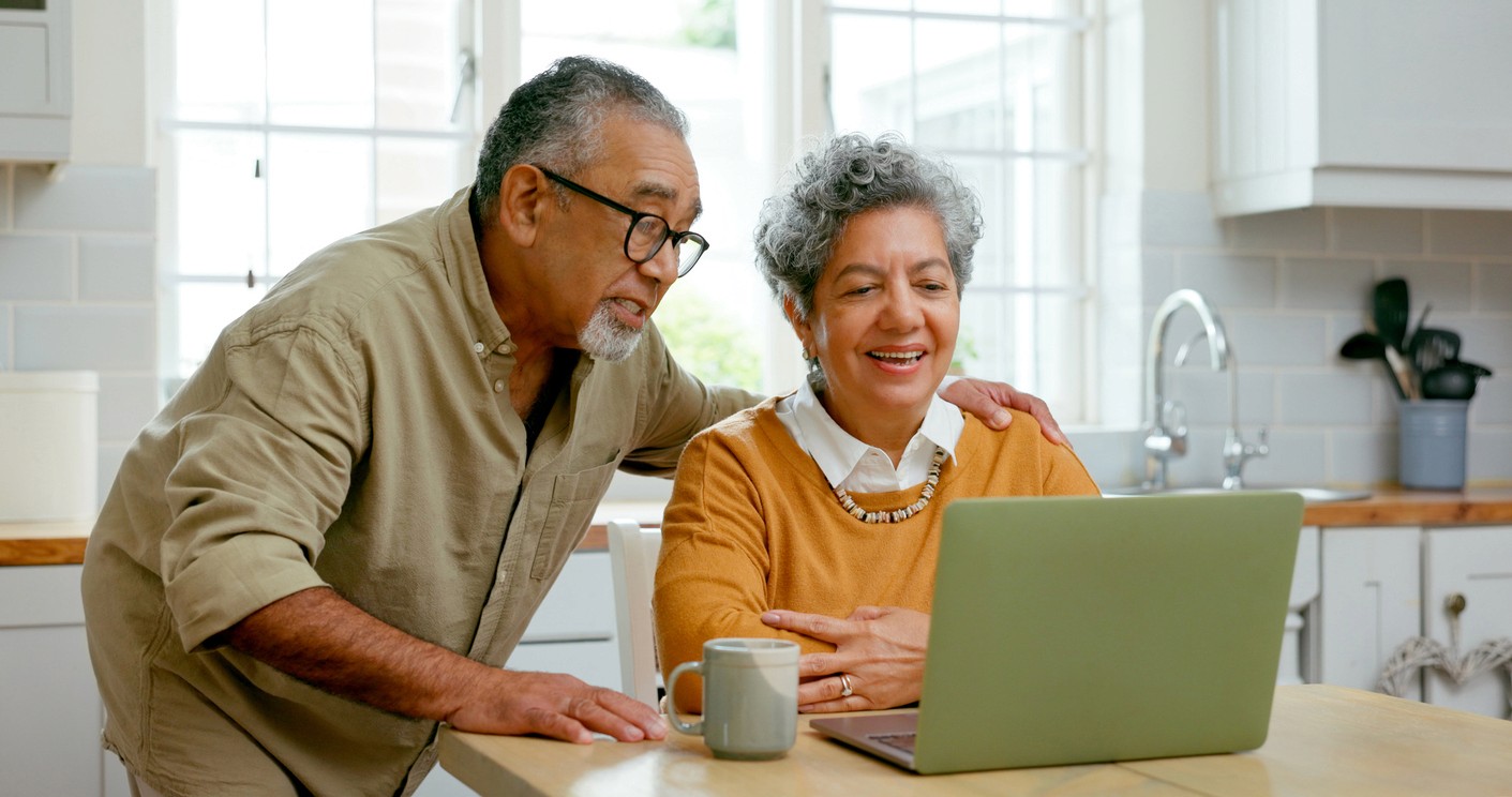 Couple reviewing marketing email for healthcare services