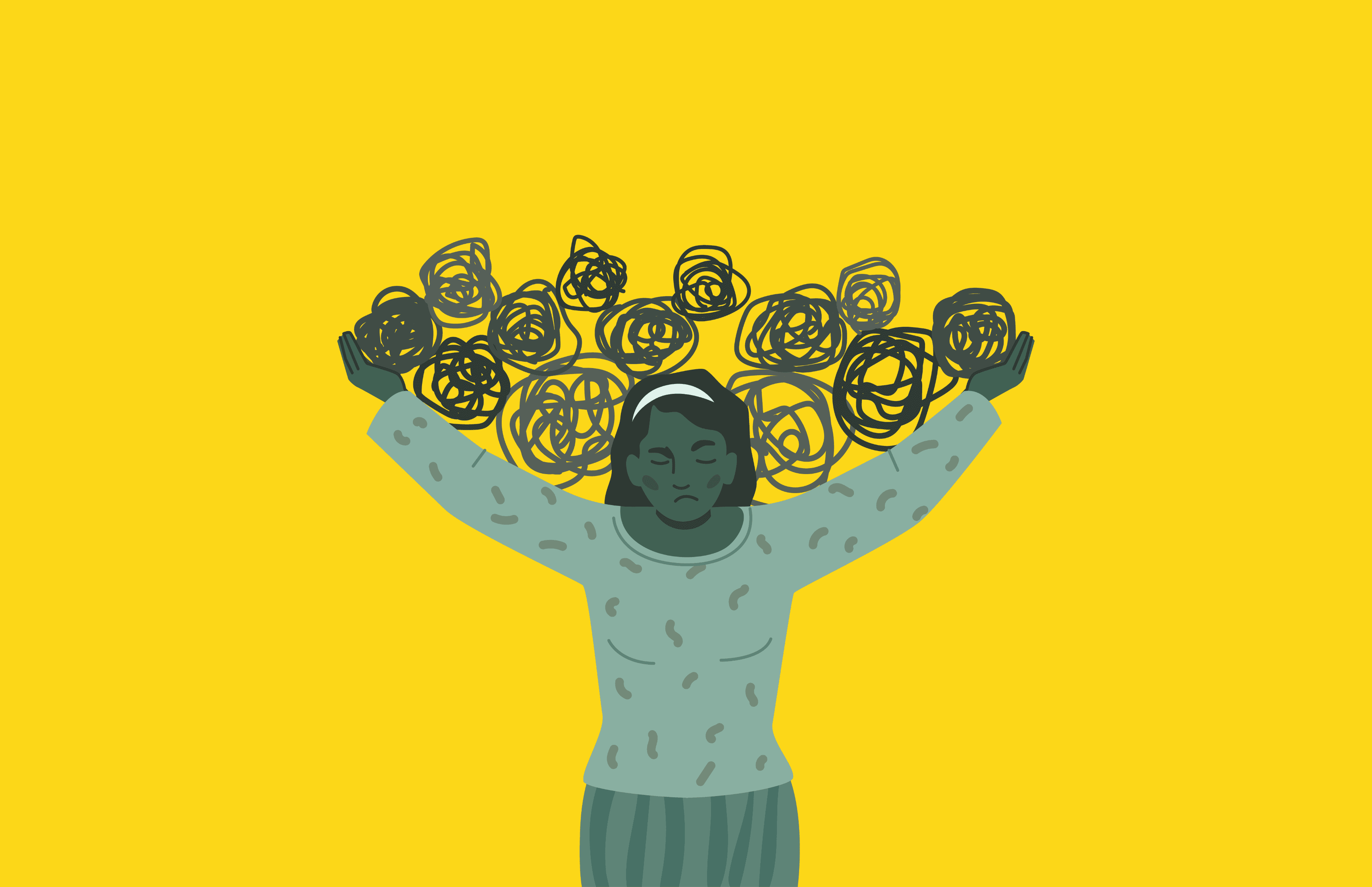 a sculpture of a person on top of a ball