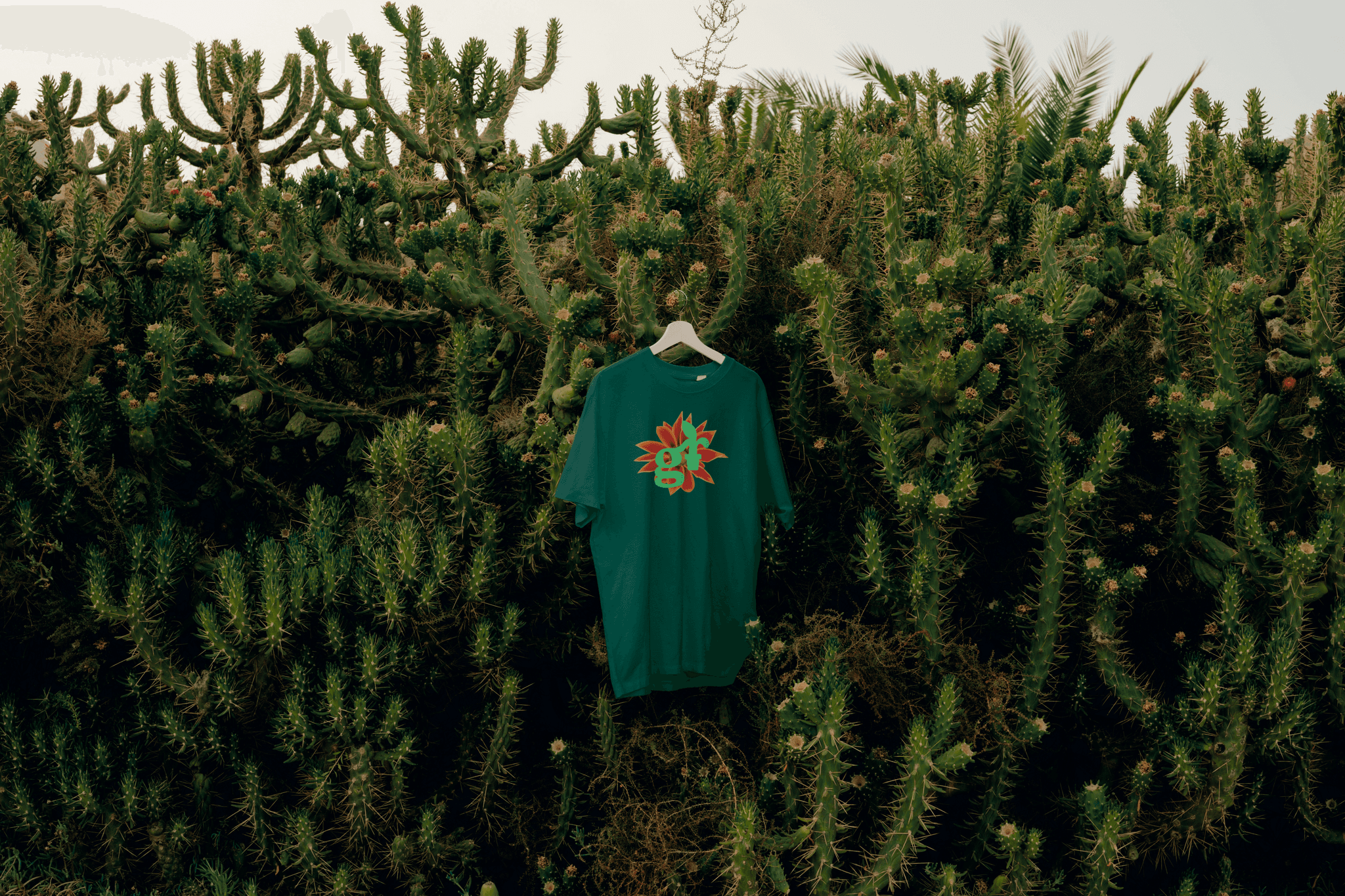 Tshirt for a garden centre with logo handing in plants and shrubs