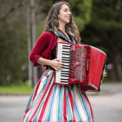 Lucy performing her accordion.