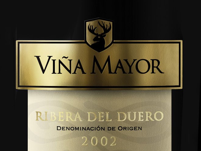 Rustic cabin in a golden field at sunset