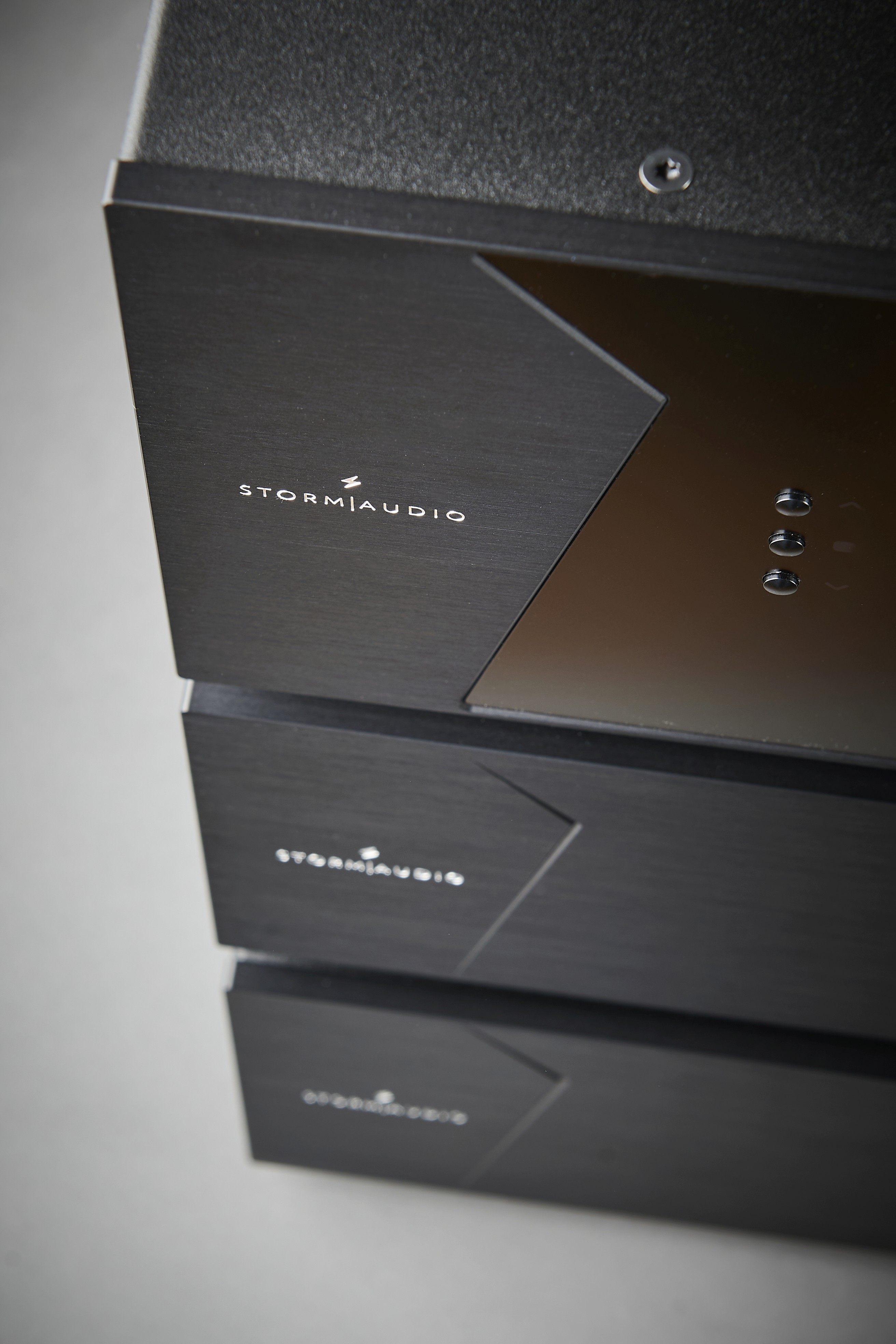StormAudio logo and buttons on black equipment