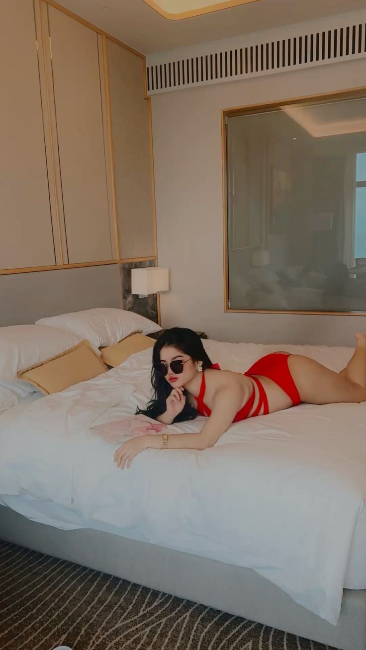 kids lying on a glass land and smiling