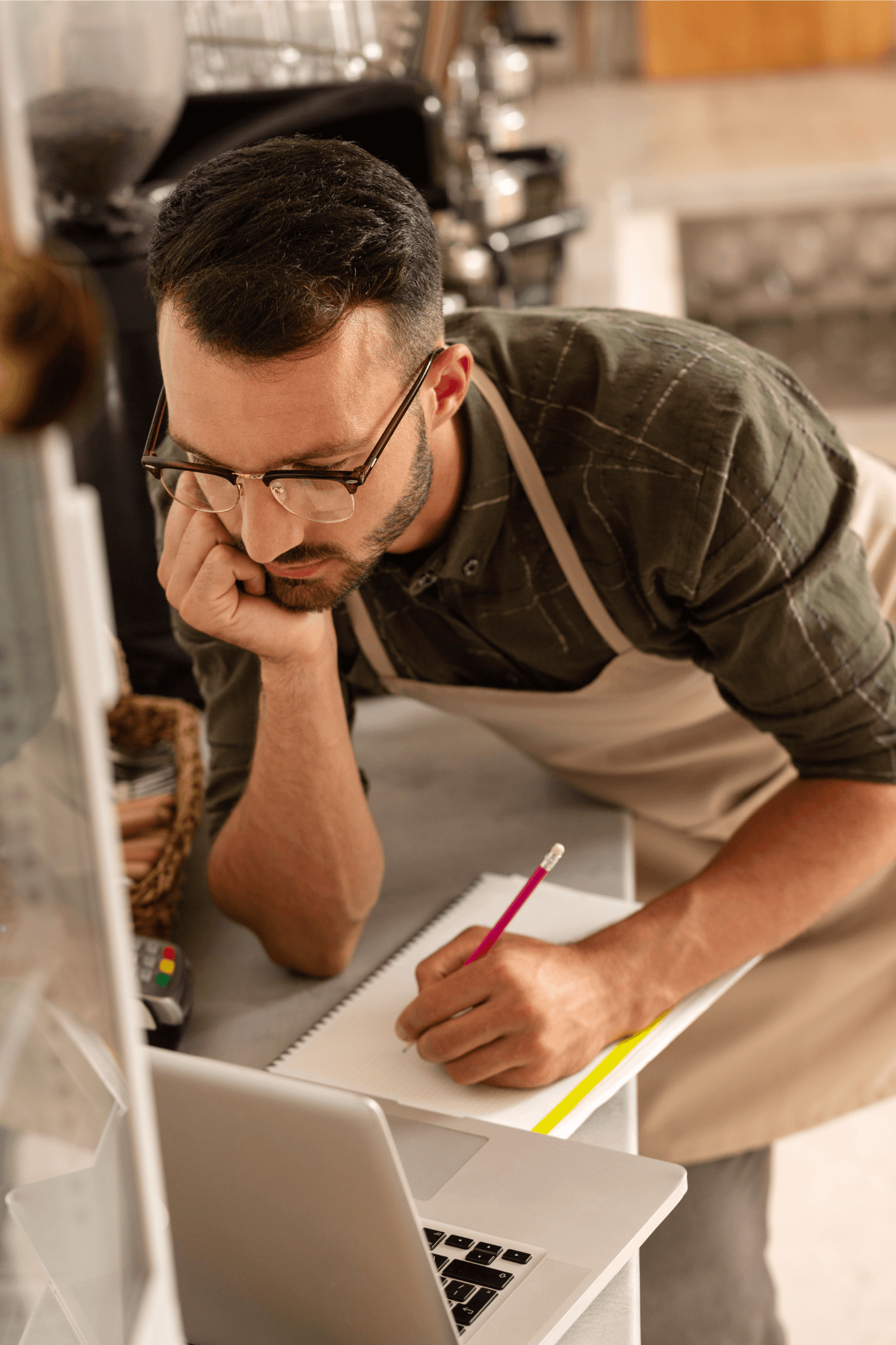 business owner reviewing notes