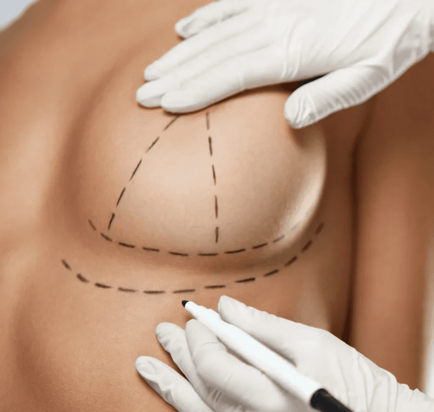 person sitting while using laptop computer and green stethoscope near