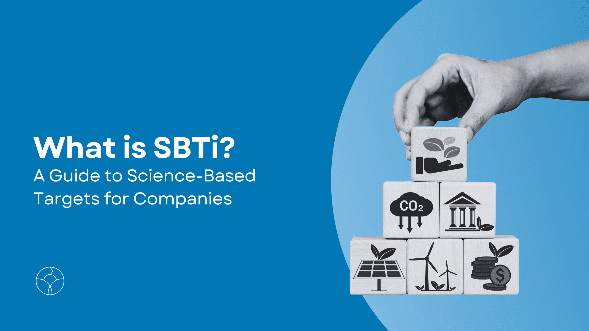 One hand added a final green cube to a structure made of cubes symbolizing CO2 emission reduction, renewable energy, and sustainability, in the cover visual of the blog titled "What is SBTi?".