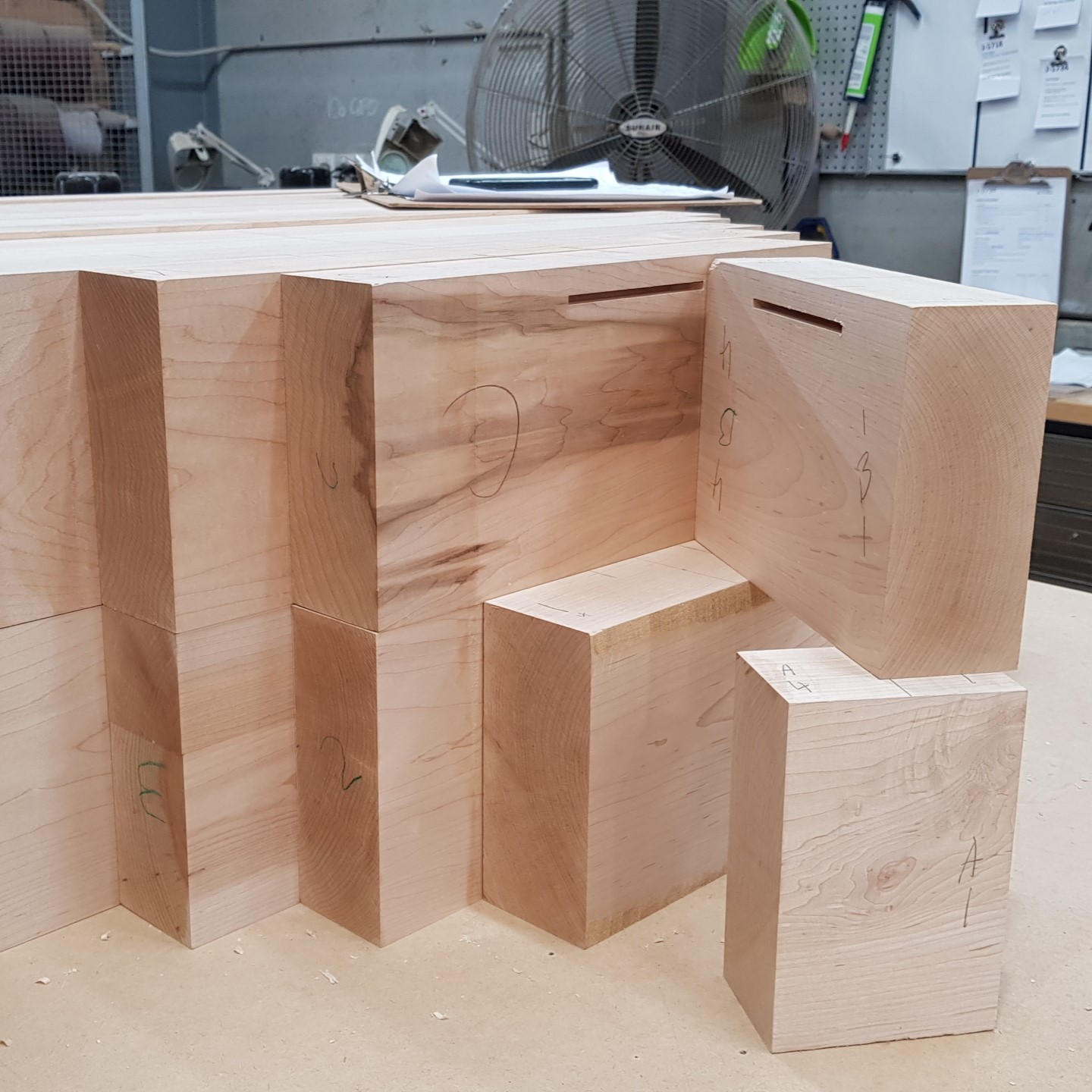 Ply tongues were inserted into each block of wood to help alignment during the laminating process