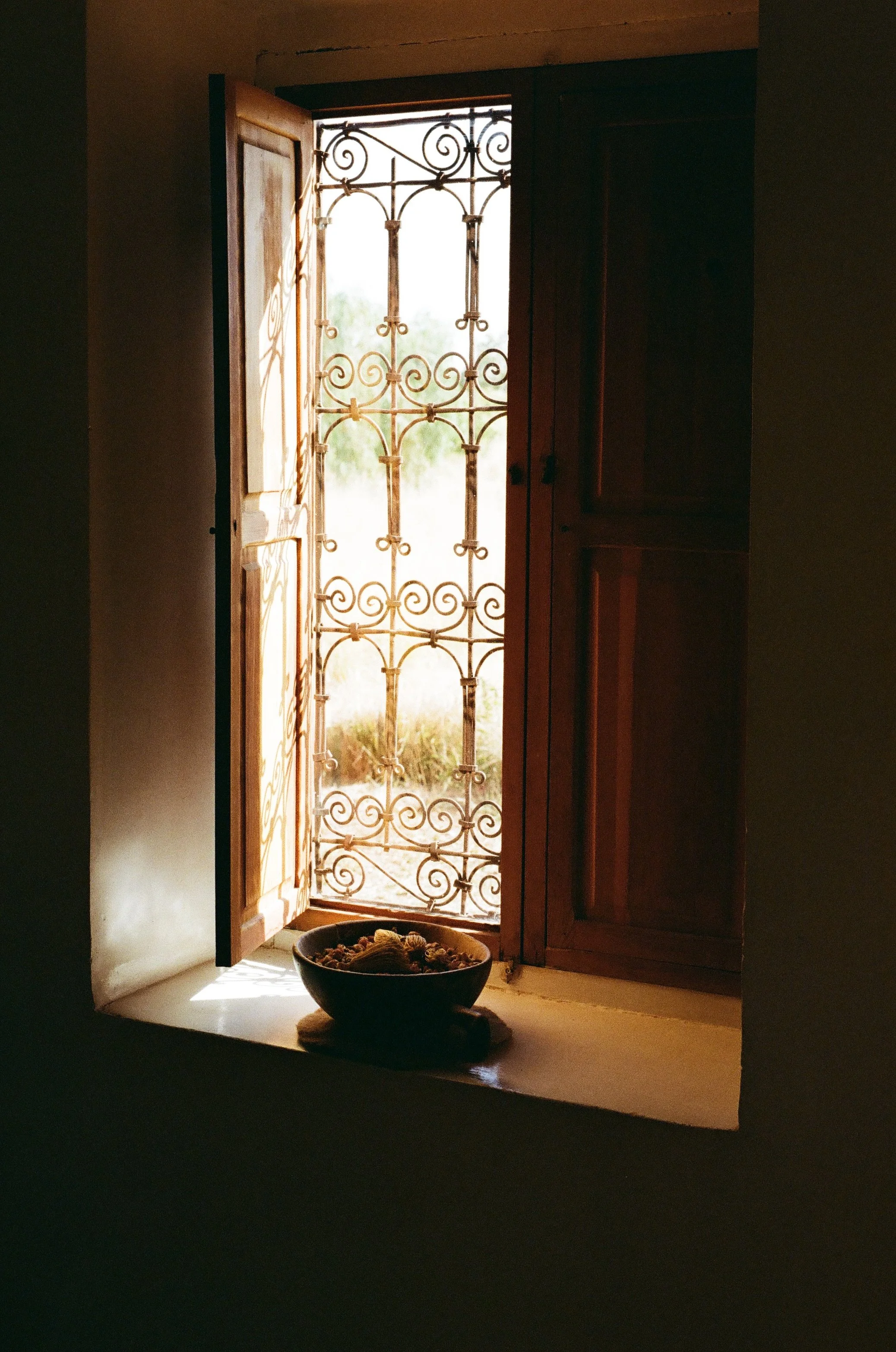 Portrait-format view of textured architecture at Dar Tasmayoun, Morocco.