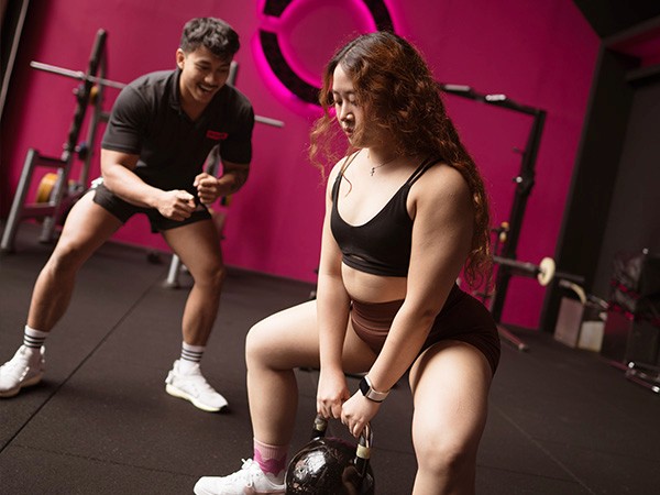 personal training in kuala lumpur, woman having a strength training with a personal coach