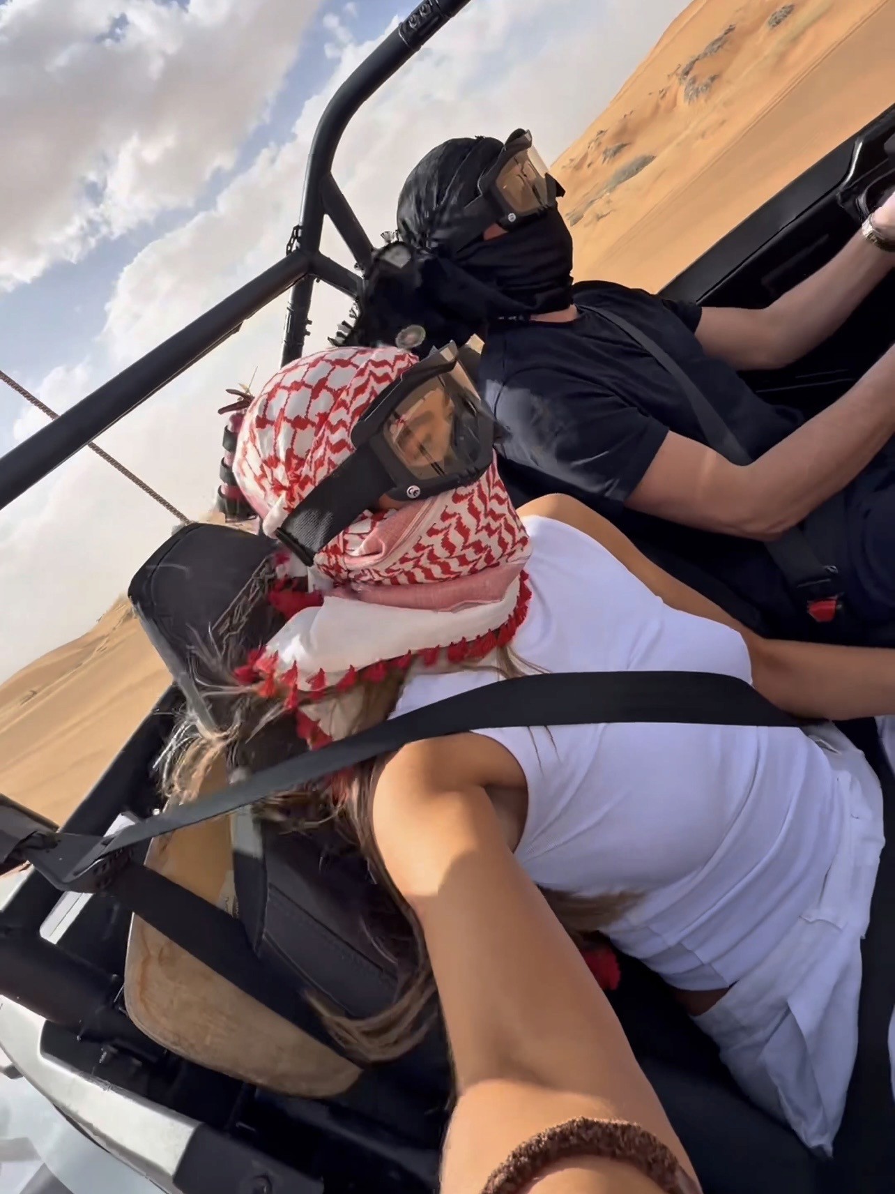 Alt Text: "Amy Tierney on a 2026 Desert Safari with Dune Quest Tours, enjoying an adrenaline-fueled buggy ride through the Dubai dunes
